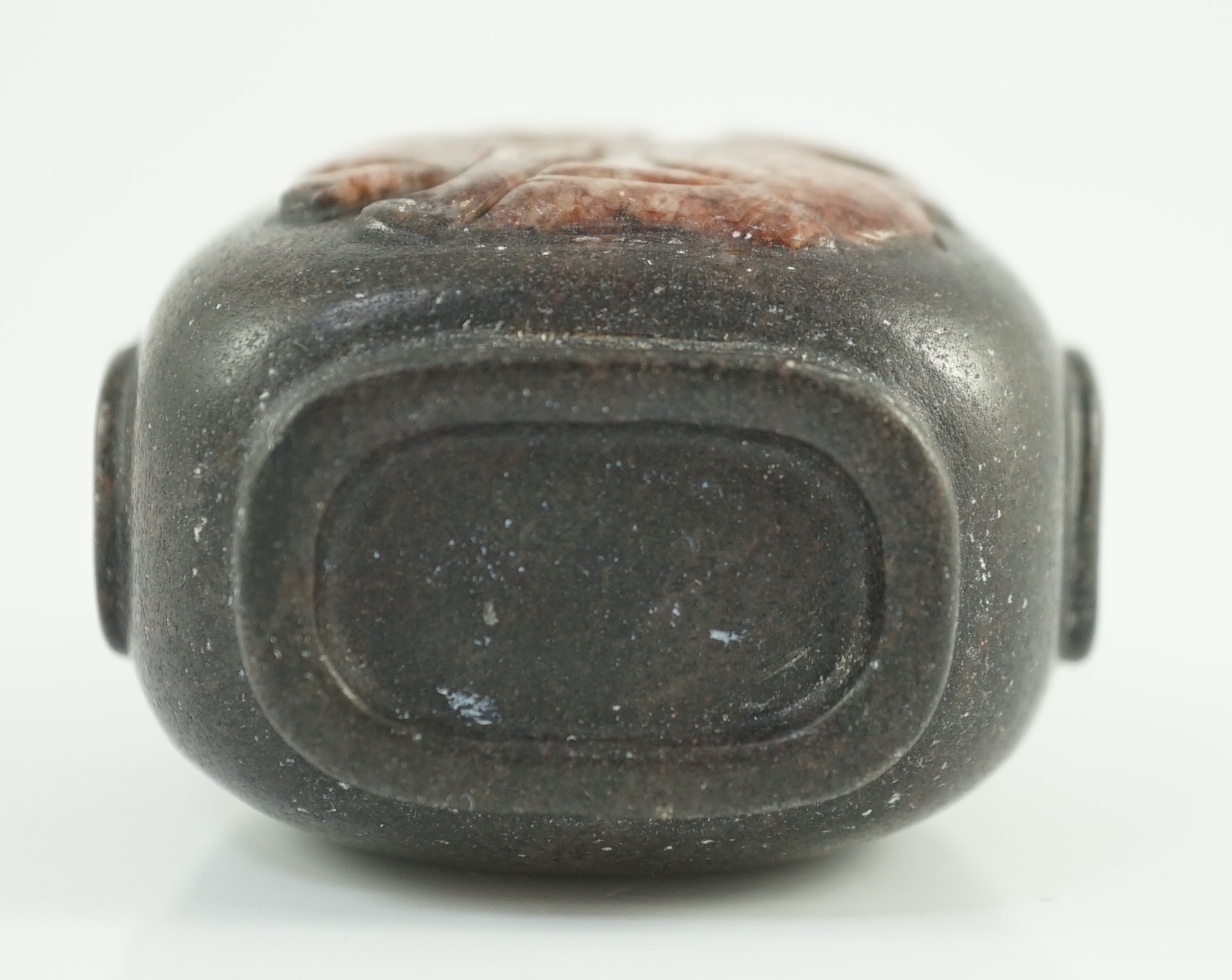 A Chinese two colour marble cameo ‘tiger’ snuff bottle, 19th century, 5.4cm high